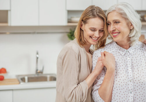 Cute,Young,Daughter,Embracing,Her,Mother,With,Love